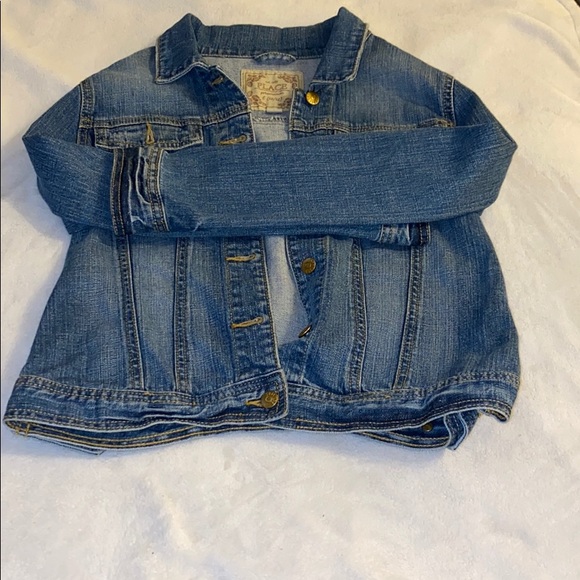 It’s a light blue denim jacket. - Picture 2 of 3